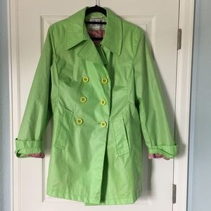 Bright green raincoat with pink lining